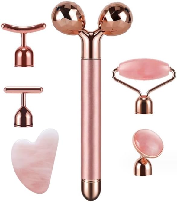 Natürlicher Jade-Gesichtsroller und verschiedene Gesichtsmasseure in Roségold und Rosa.